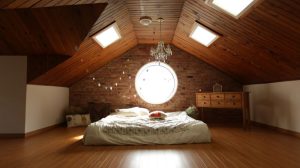 White pillow on a neatly made bed showing loft height
